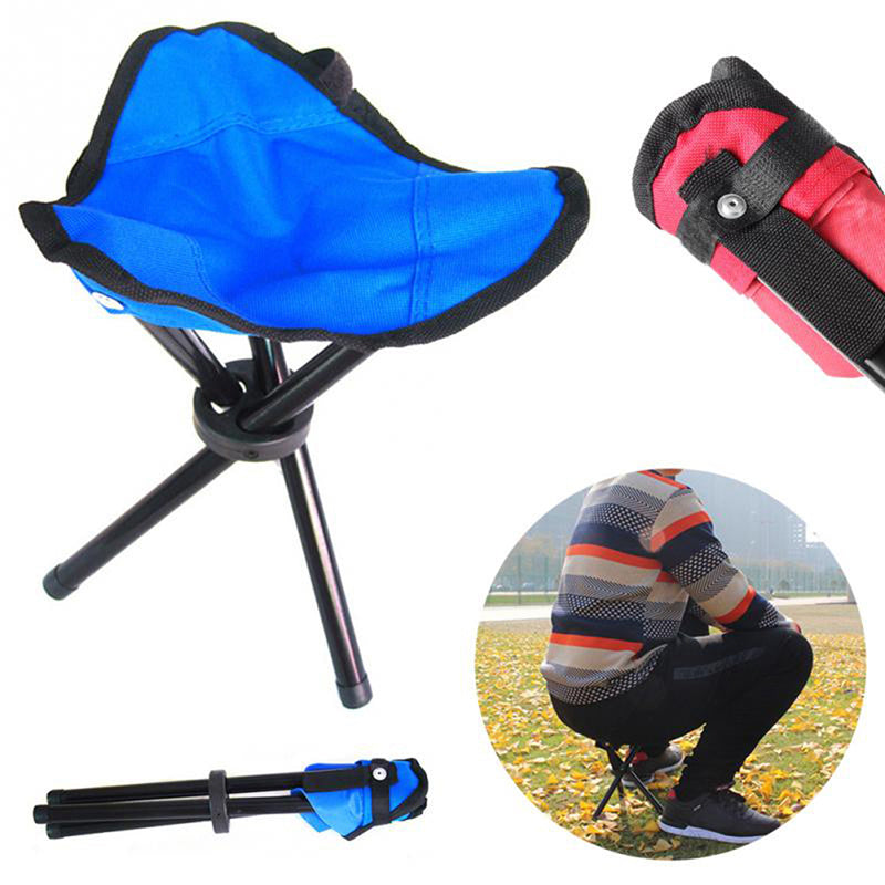 Blue folding chair with tripod legs, pink carrying case, and person using chair in outdoor setting.