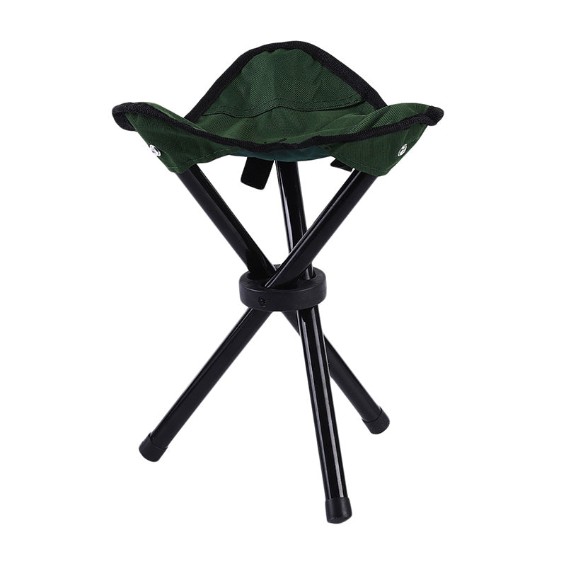 Green folding stool with black legs on a white background