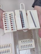 Person demonstrating functions of vegetable cutter slicing and chopping various vegetables in a kitchen